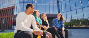 Aalto University students enjoying sunny weather